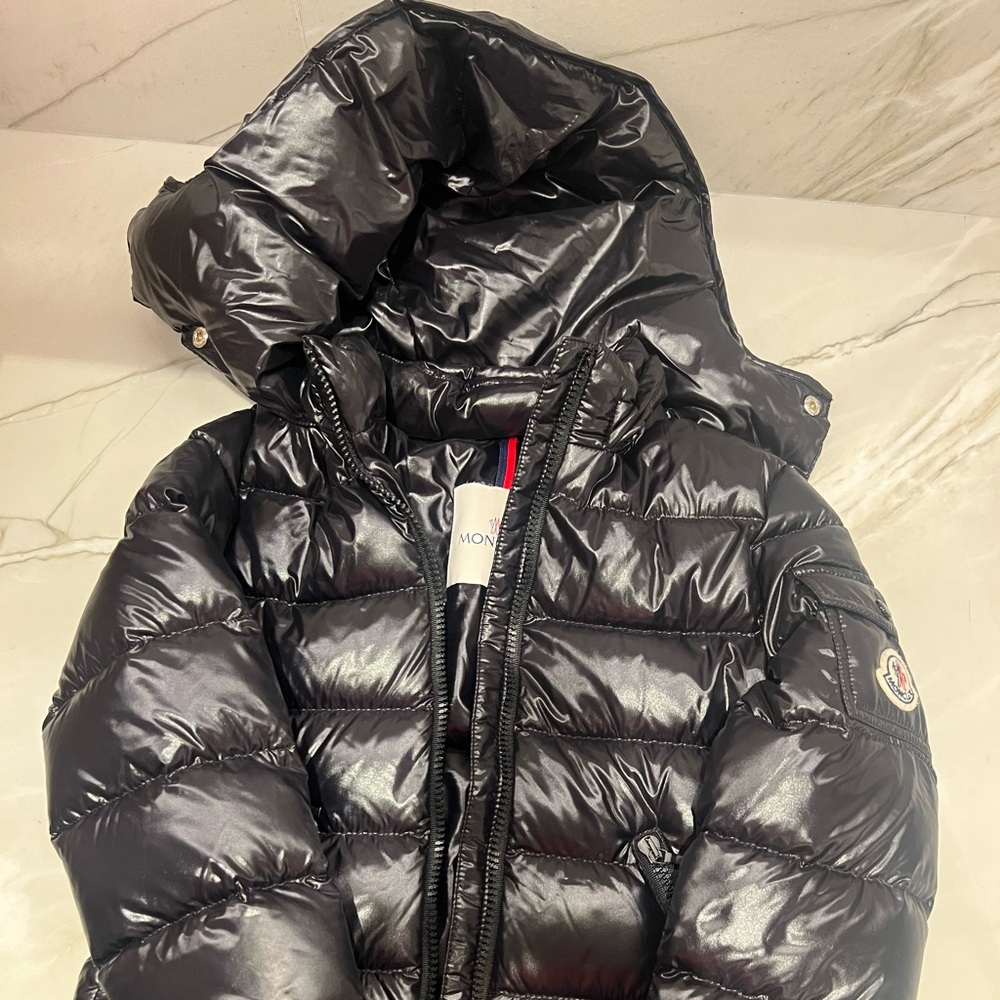 Moncler unisex jacket.  Slightly worn.  Excellent condition